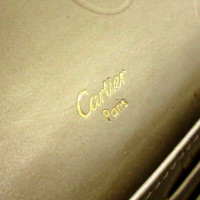 Cartier Täschchen/Portemonnaie aus Lackleder in Gold