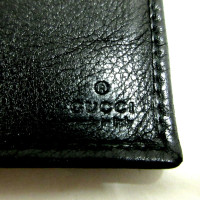 Gucci Täschchen/Portemonnaie aus Leder in Schwarz