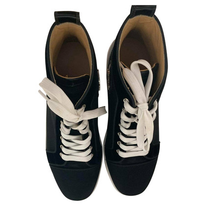 Christian Louboutin Sneakers aus Lackleder in Schwarz