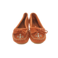 Minnetonka Slippers/Ballerinas Leather in Orange