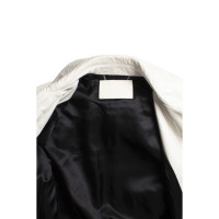 Givenchy Jacke/Mantel aus Leder in Creme