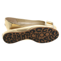 Jimmy Choo Slippers/Ballerina's Leer in Goud