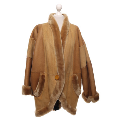 Dior Jacke/Mantel aus Pelz in Braun