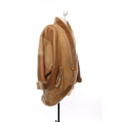 Dior Jacke/Mantel aus Pelz in Braun