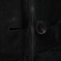 Burberry Jacke/Mantel aus Pelz in Schwarz