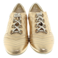 Versace Chaussures de sport en or