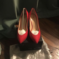 Giuseppe Zanotti Chaussures compensées en Cuir verni en Rouge