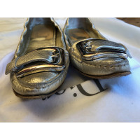 Christian Dior Slippers/Ballerina's Leer in Goud