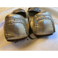 Christian Dior Slippers/Ballerina's Leer in Goud