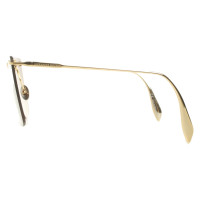 Alexander McQueen Sunglasses in Gold