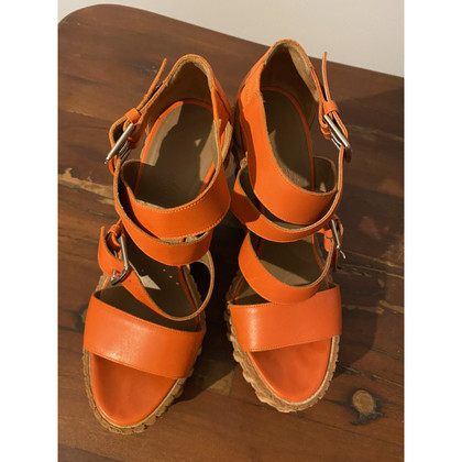 Hermès Chaussures compensées en Cuir en Orange