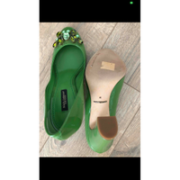 Dolce & Gabbana Chaussures compensées en Cuir verni en Vert