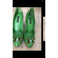 Dolce & Gabbana Chaussures compensées en Cuir verni en Vert
