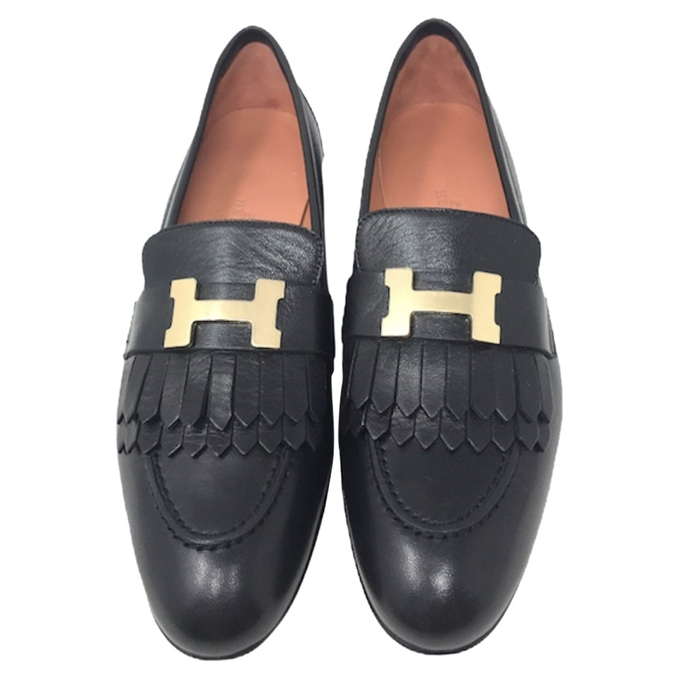 Hermès Slipper/Ballerinas aus Leder in Schwarz