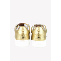 Coach Sneakers aus Leder in Gold
