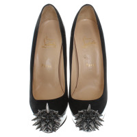 Christian Louboutin pumps met spiked studs