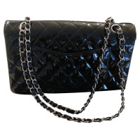 Chanel Classic Flap Bag Extra Mini aus Leder in Schwarz