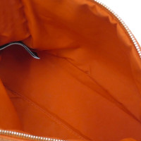Hermès Täschchen/Portemonnaie aus Canvas in Orange