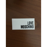 Moschino Love Sac à dos en Cuir verni en Beige