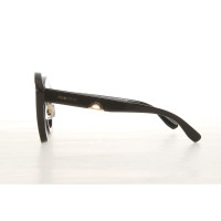 Miu Miu Sunglasses in Black