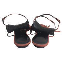 Gucci Orange flat sandals with fringes