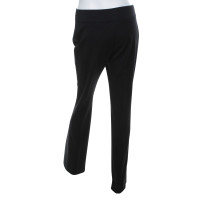 Gianni Versace trousers in black