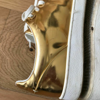 Louis Vuitton Sneaker in Pelle in Oro