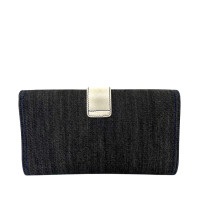 Yves Saint Laurent Clutch aus Jeansstoff in Blau