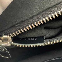Louis Vuitton Kleber aus Leder in Schwarz