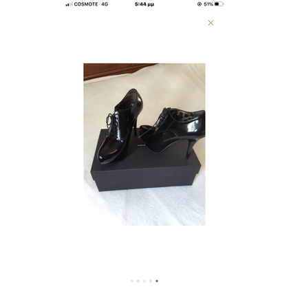 Dolce & Gabbana Stiefeletten aus Lackleder in Schwarz