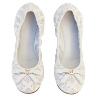 Louis Vuitton Slippers/Ballerina's Leer in Grijs
