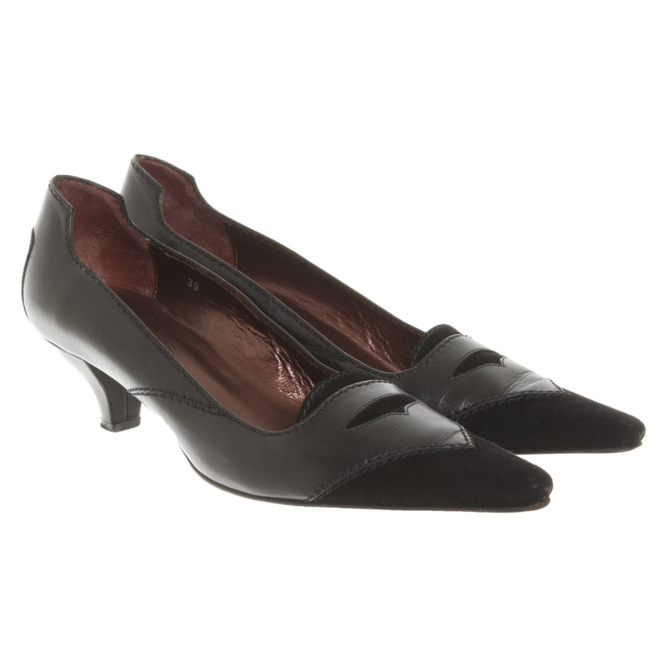 Tod's Pumps/Peeptoes aus Leder in Schwarz