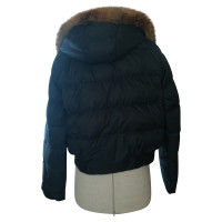 Moncler Jacke/Mantel aus Baumwolle in Schwarz