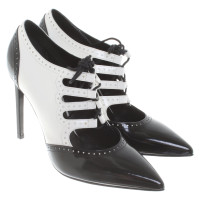 Yves Saint Laurent pumps in bianco e nero