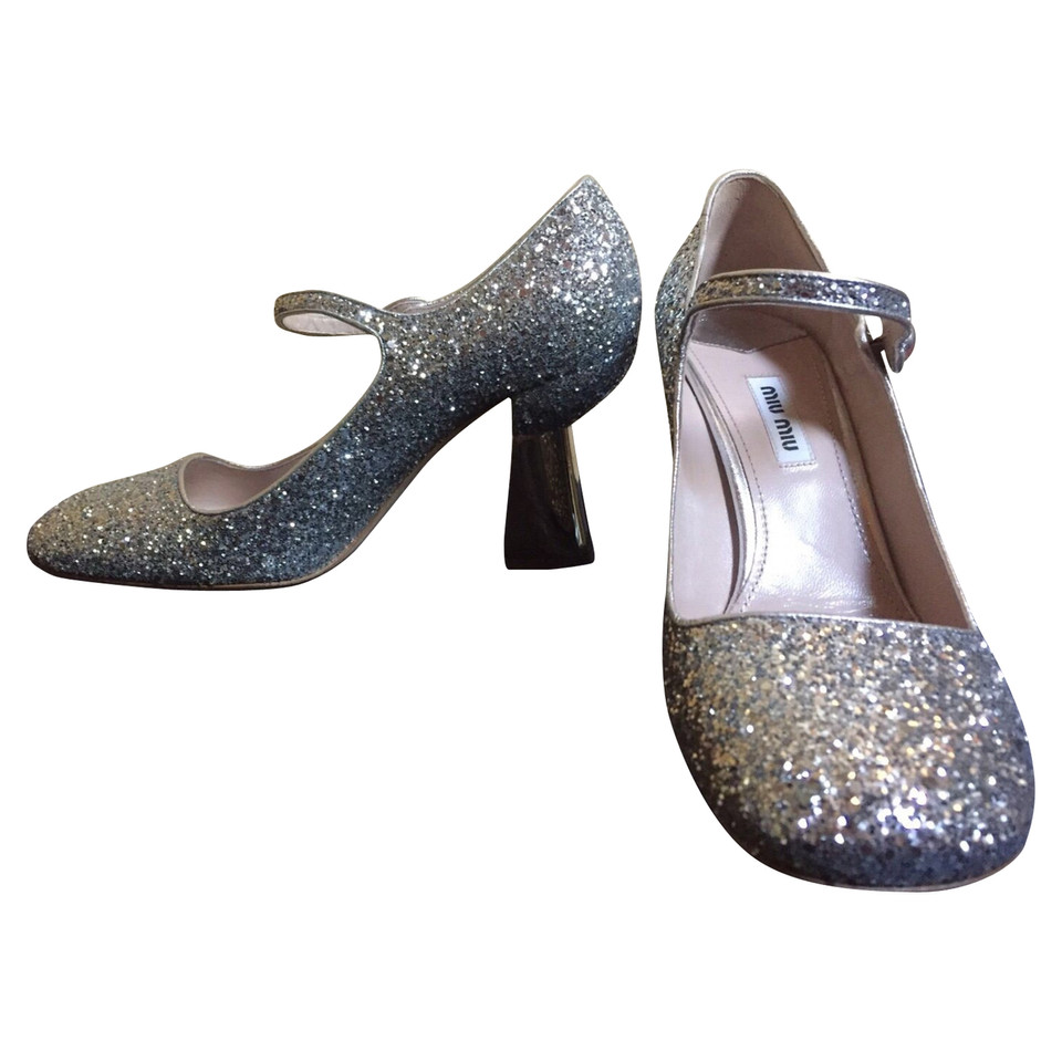 Miu Miu pumps con finiture glitterate