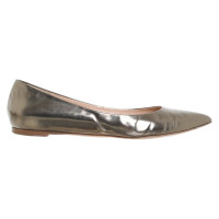 Gianvito Rossi Slipper/Ballerinas aus Lackleder in Gold