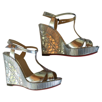 Christian Louboutin Wedges Patent leather in Silvery
