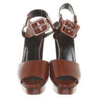 Hermès Sandals Patent leather in Brown
