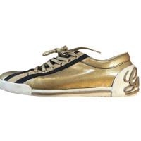 Gucci Sneakers Lakleer in Goud