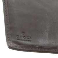 Gucci Porte-monnaie avec des motifs de Guccissima