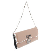 Christian Louboutin Patent leather clutch in nude