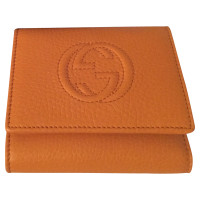 Gucci Täschchen/Portemonnaie aus Leder in Orange