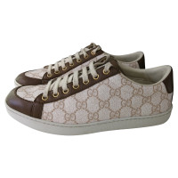 Gucci Chaussures de sport en Cuir en Beige