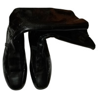 Prada Stiefel aus Lackleder in Schwarz
