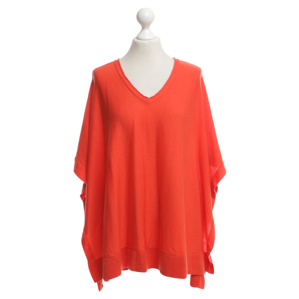 Laurèl poncho tricotée à Orange