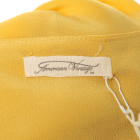 American Vintage Zijden blouse in geel