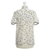 Baum Und Pferdgarten Blouse avec un motif floral