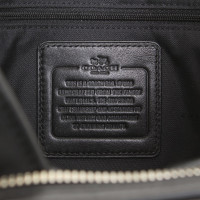 Coach Handbag with monogram pattern