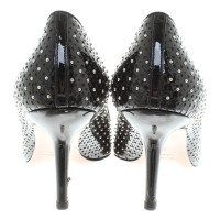 Miu Miu pumps con rivetti