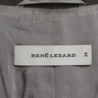 René Lezard Pak met een blazer en rok
